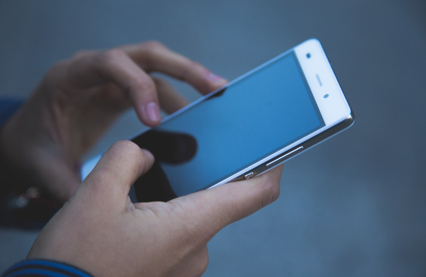 young person with phone