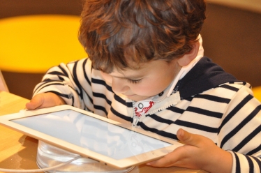 child with laptop