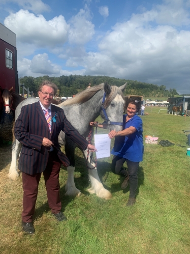 The winning horse with John and owner